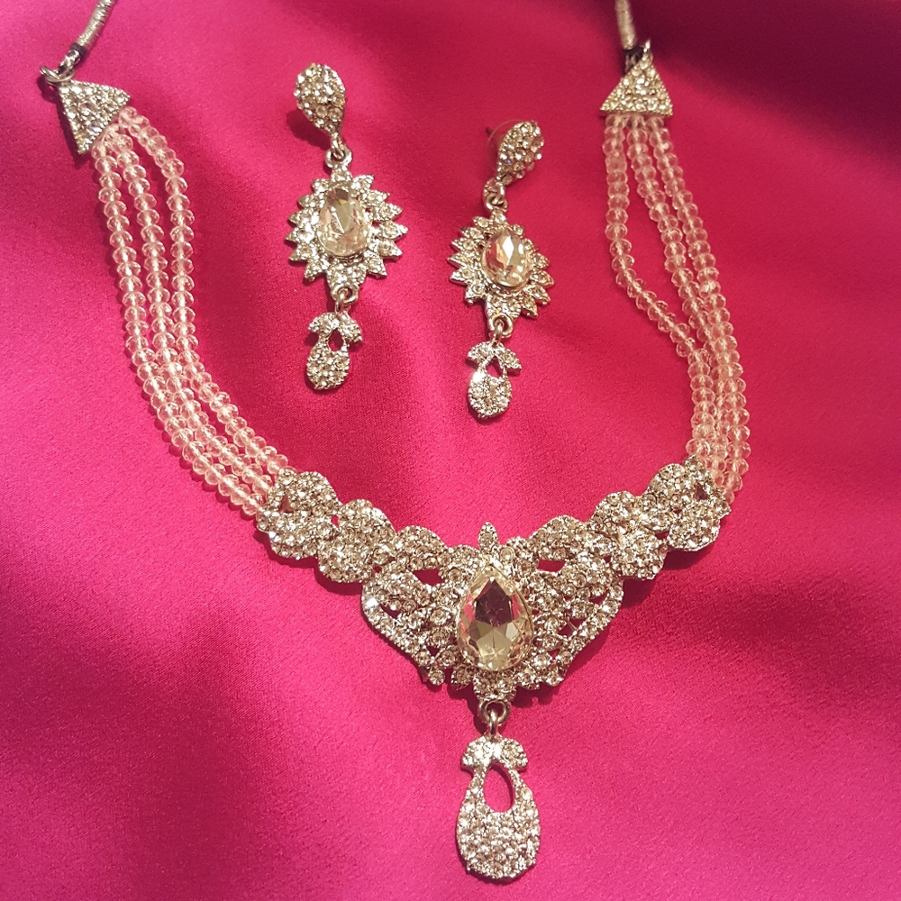 Silver stone and white beaded necklace and earings